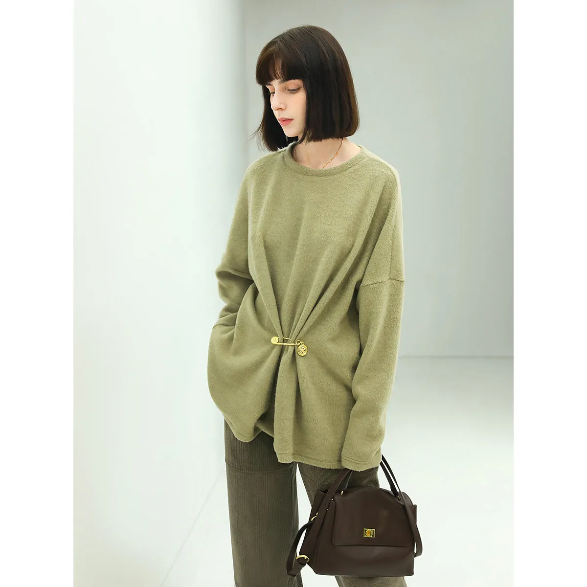 Oversized Green Fleece Knit with a Stylish Cinched Brooch Pin